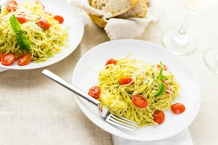 Heavenly gluten-free angelic pasta with tomatoes, zucchini and mozzarella