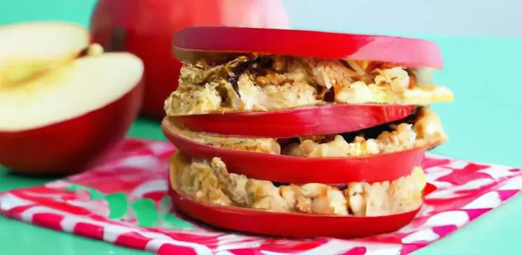 Apple almond butter sandwiches with granola