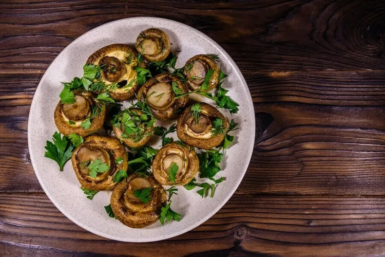 Baked garlic mushrooms with oregano, basil and parsley