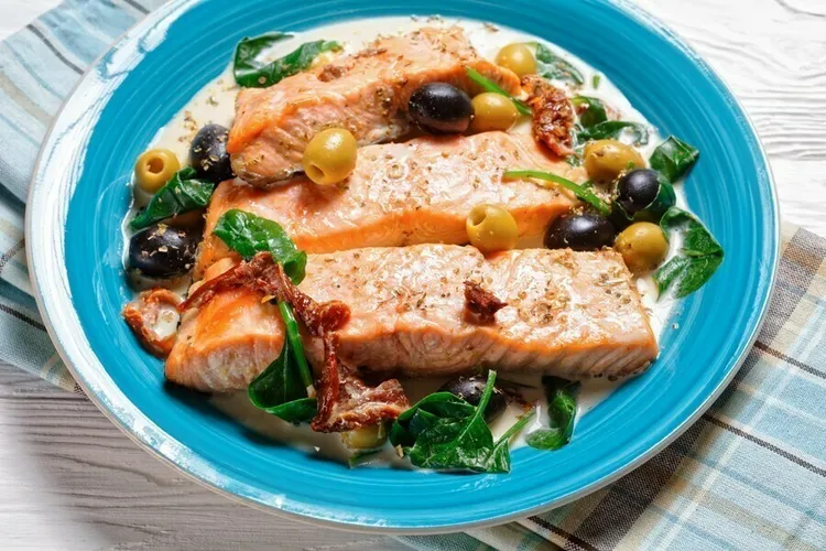 Balsamic-glazed salmon with spinach, olives and golden raisins