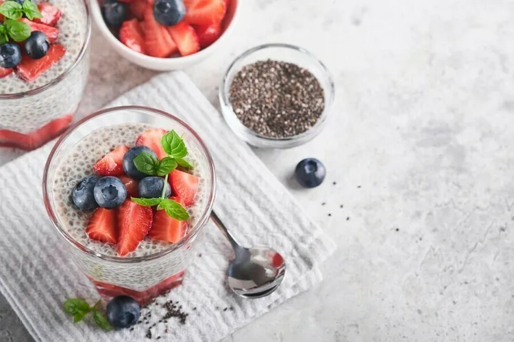 Strawberry-blueberry chia pudding with cottage cheese and greek yogurt
