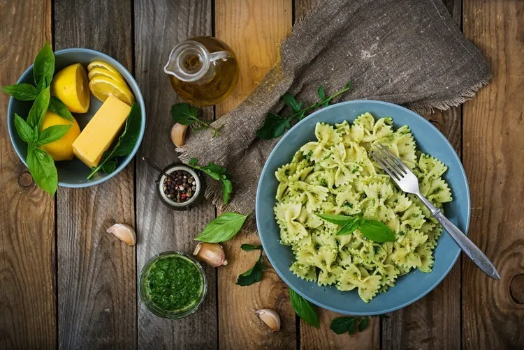 Bow tie pasta with zucchini and onion in olive oil