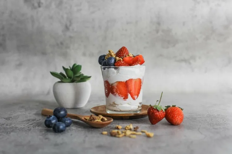 Strawberry-blueberry greek yogurt parfait with almonds
