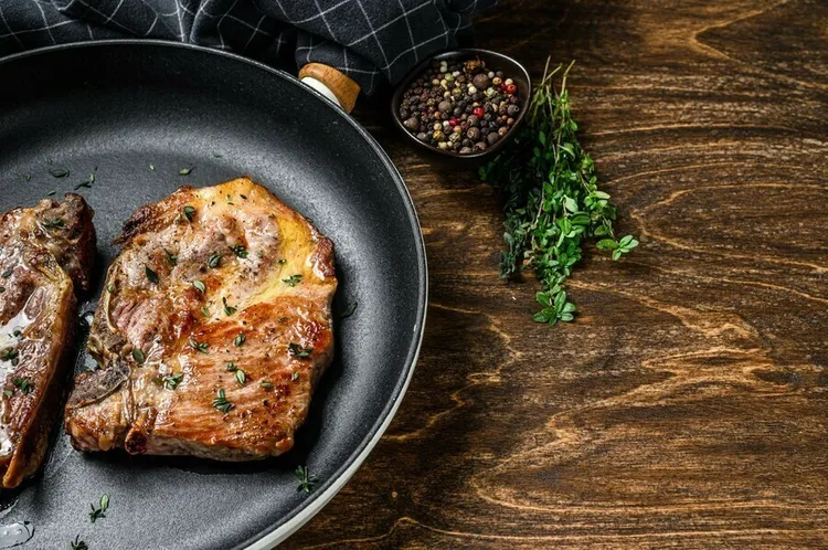 Herb-brined and grilled pork chops with lemon
