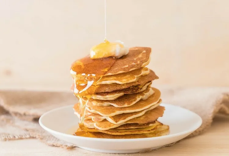 Whole-grain wheat buttermilk pancakes with applesauce