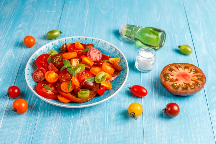 Citrusy cherry tomato salad with chives and olive oil
