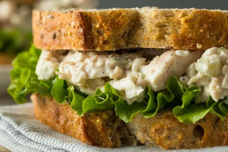 Chicken mayo sandwich with lettuce on whole-wheat bread