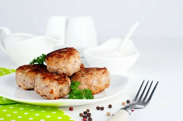 Homemade chicken sausage patties with fennel and chives