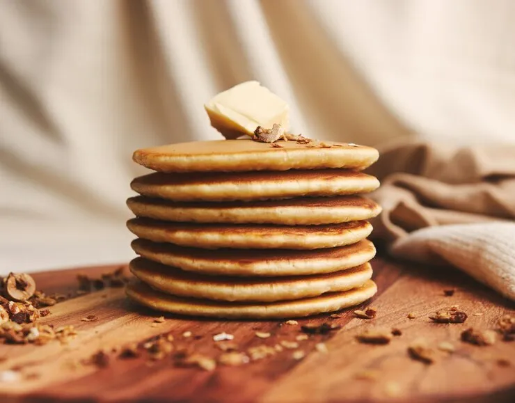 Cinnamon-nutmeg oatmeal pancakes with a dash of salt