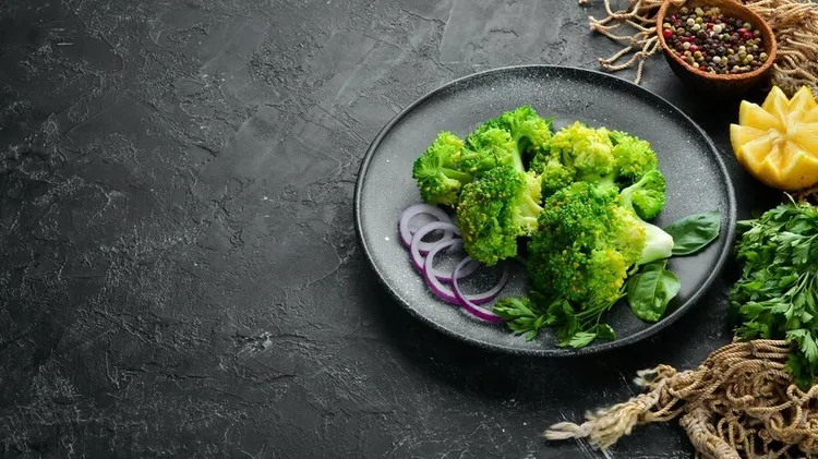 Garlic-infused sauteed broccoli with red pepper and black pepper