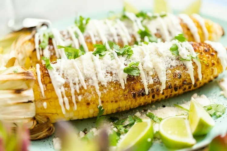 Grilled corn on the cob with mint-feta butter