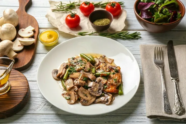 Lemon chicken with asparagus and mushrooms in coconut milk