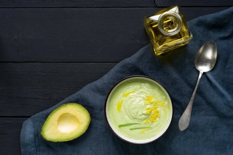 Cucumber avocado soup with lemon and herbs