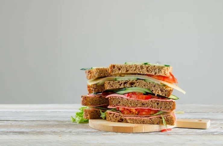 Cucumber, tomato, ham and cheese whole-wheat sandwich