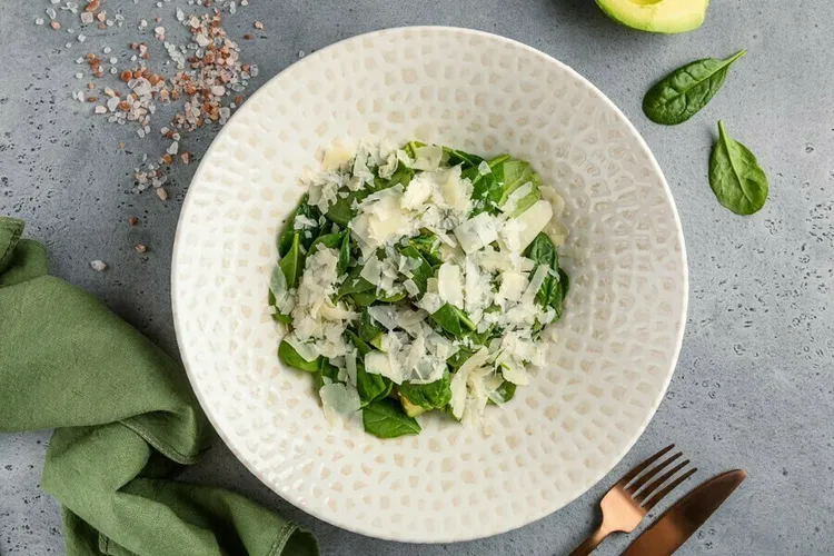 Curry spinach salad with parmesan cheese