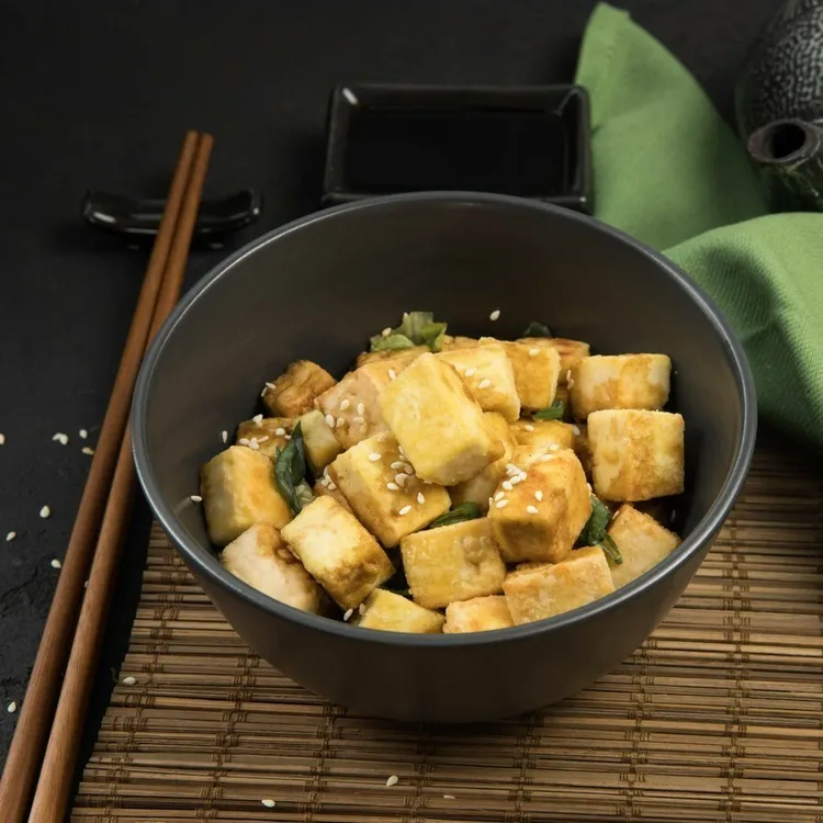 Garlic-infused tofu and green bean stir-fry
