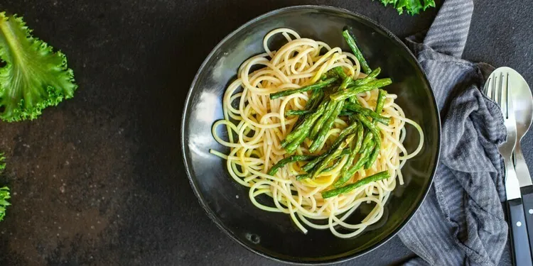 Garlic parmesan angel hair pasta with roasted asparagus and onions