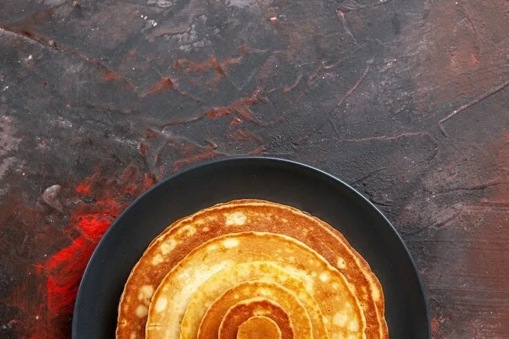 Whole-grain german pancakes with butter and milk