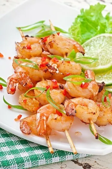 Ginger-lime grilled shrimp with red pepper, garlic and coriander