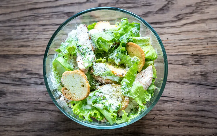 Gluten-free caesar salad with anchovies, parmesan and garlic cloves