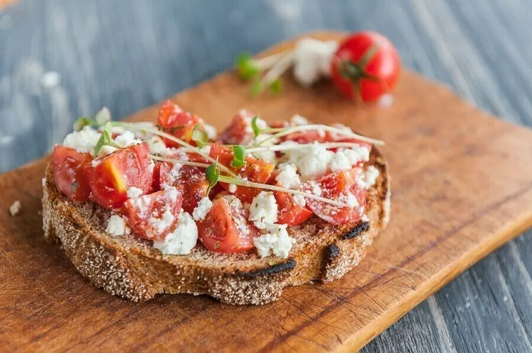 Goat cheese toast with tomatoes