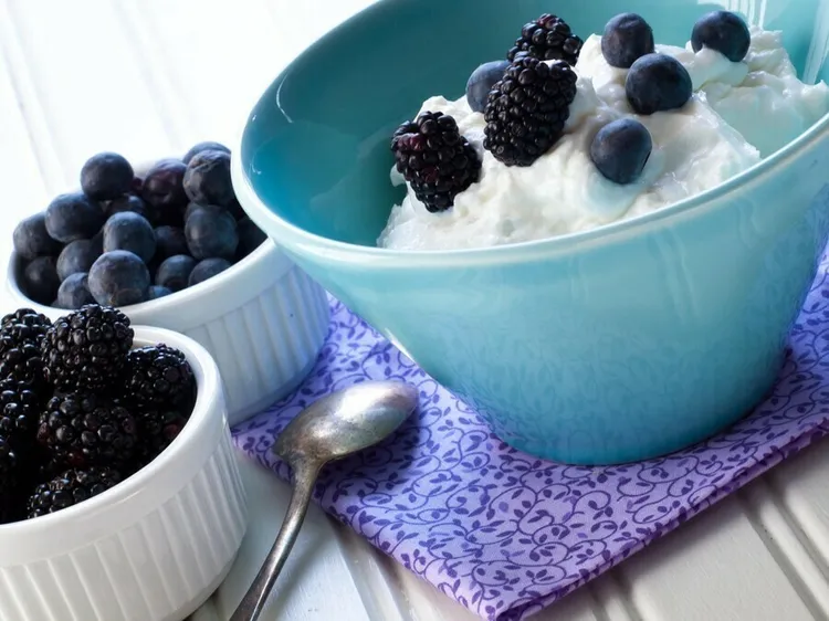 Fruity greek yogurt parfait with blackberries and blueberries