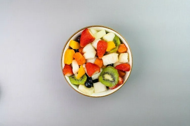 Honey & lime-glazed rainbow fruit salad