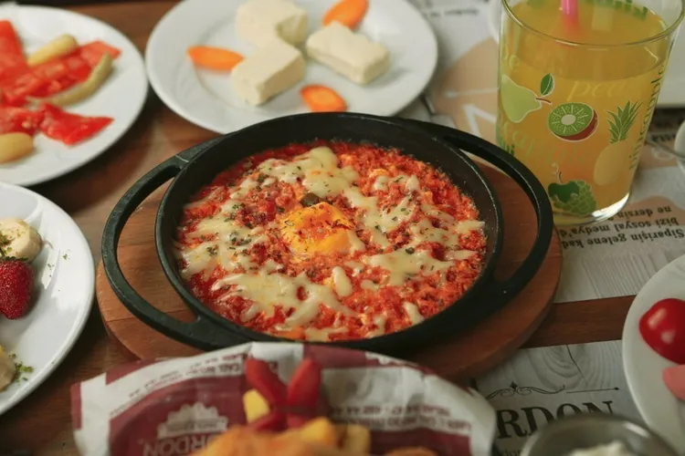 Italian baked eggs with ground turkey and parmesan cheese