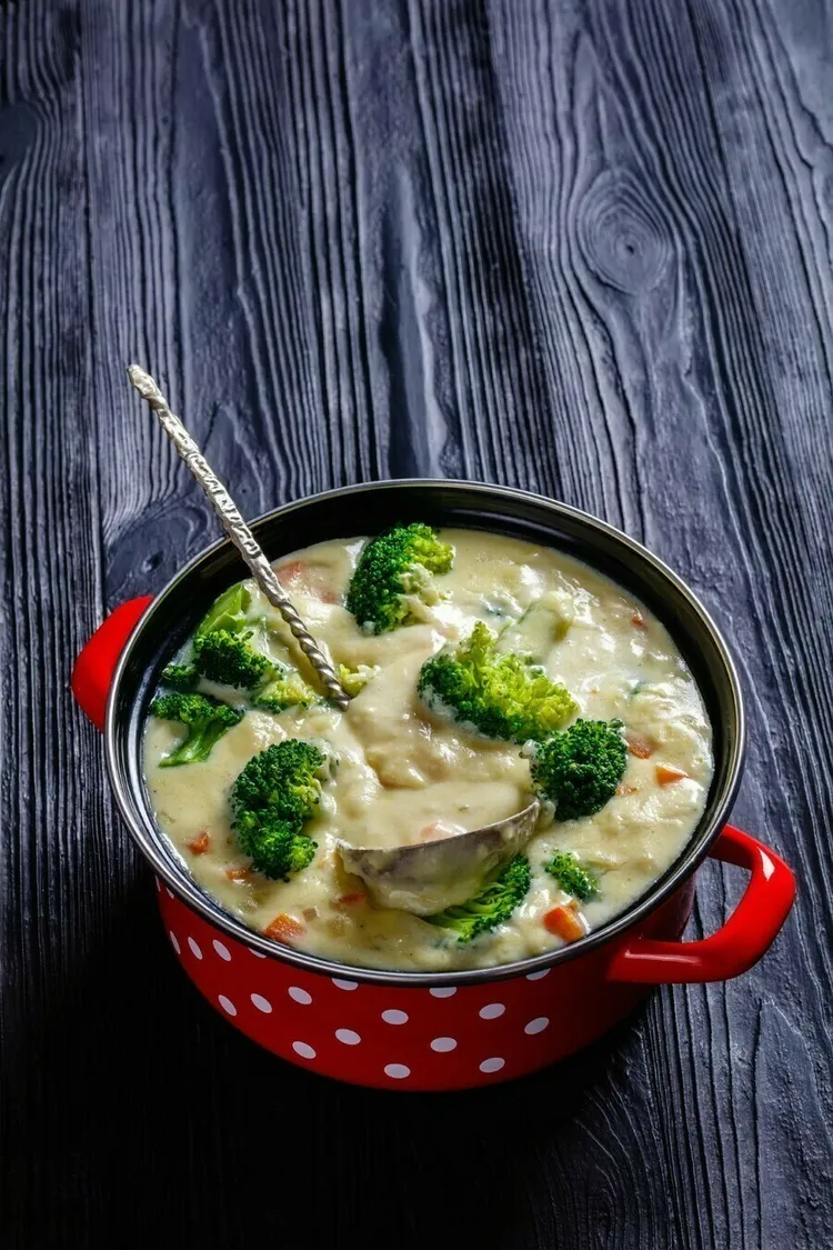 Keto chicken bacon broccoli stew with cheddar cheese and cream