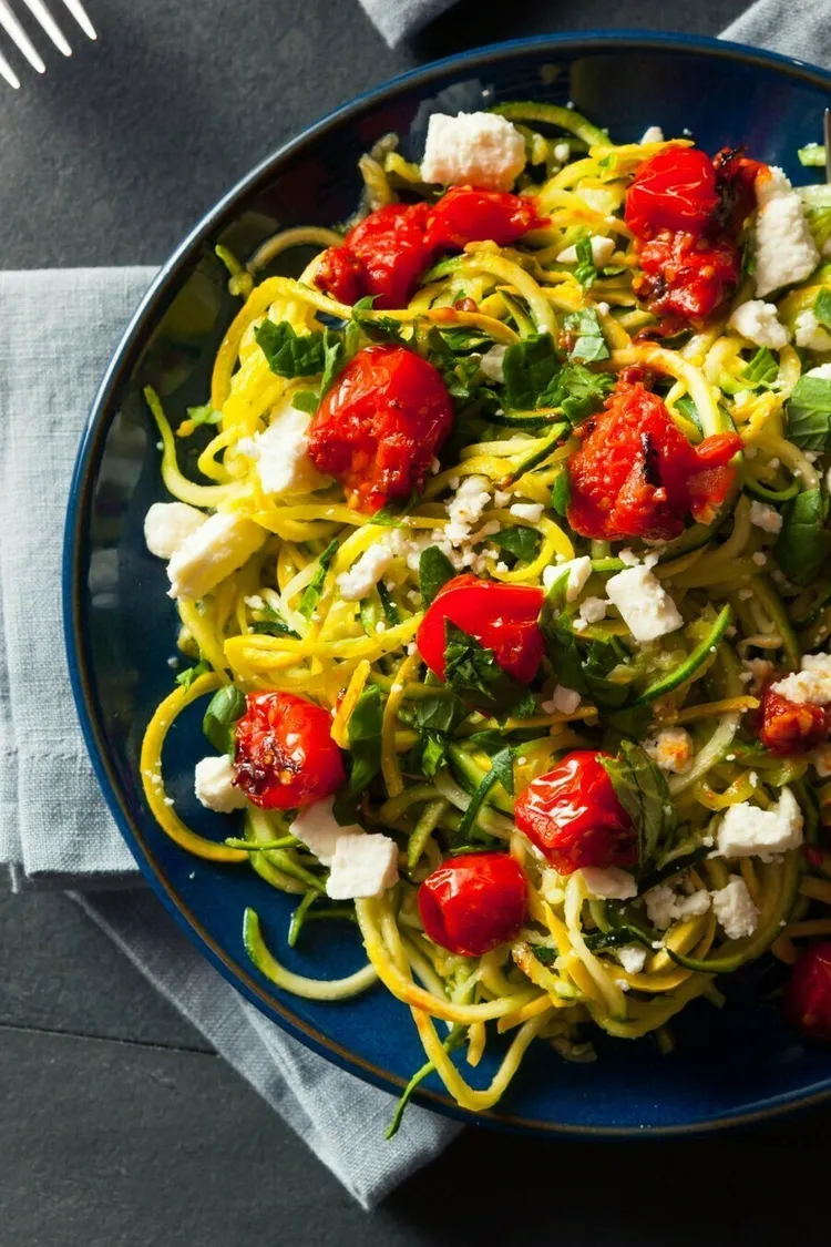 Lemon garlic chicken zoodle bowl with parmesan and red pepper