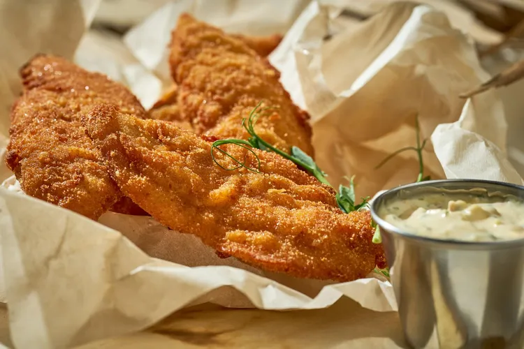 Parmesan-herb chicken tenders with spicy butter