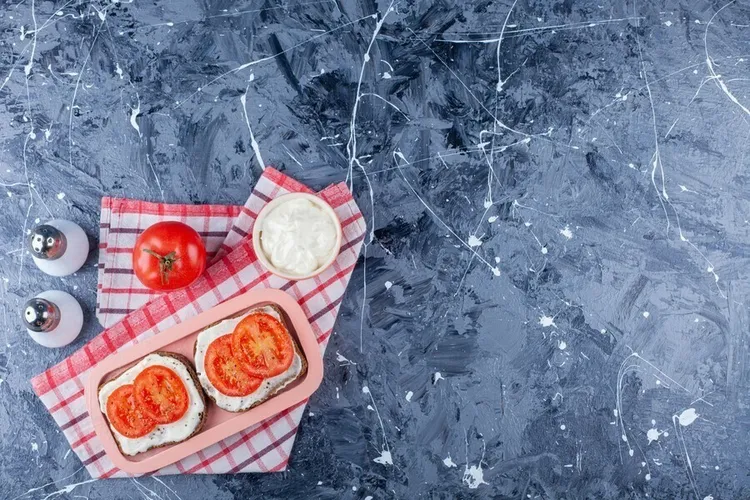 Mama's delicious broiled tomato sandwich with olive oil, mayonnaise and parmesan cheese