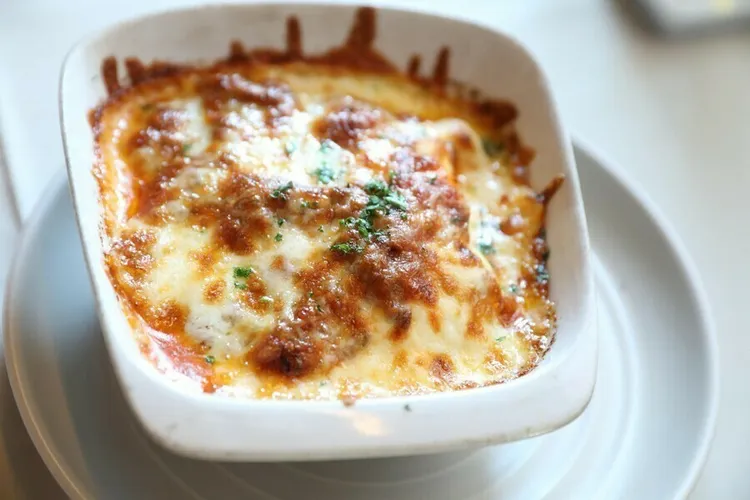 Mushroom and tomato lasagna with mozzarella and cottage cheese