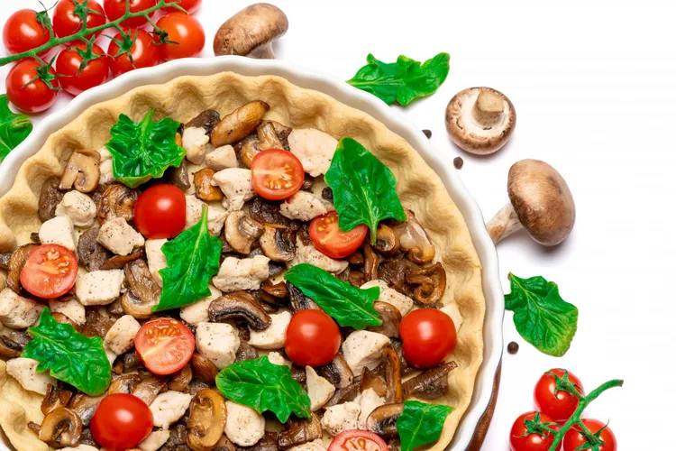Mouthwatering mushroom, spinach and tomato pita pizza