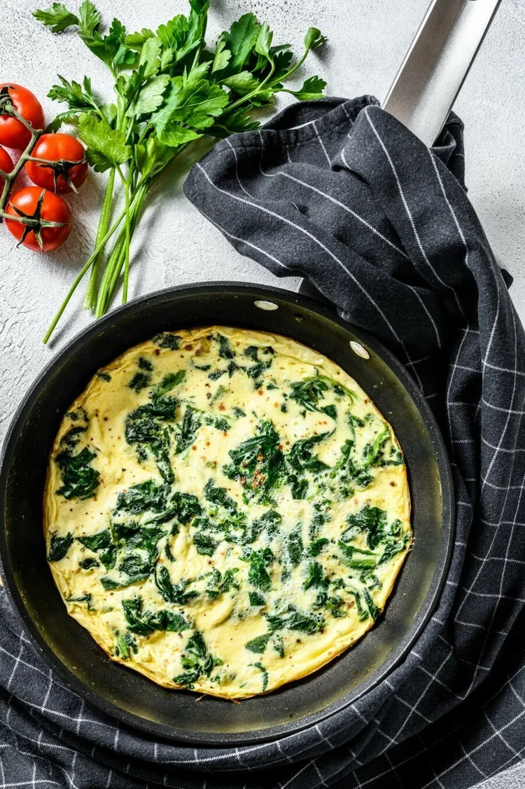 Spinach omelet with butter and seasonings