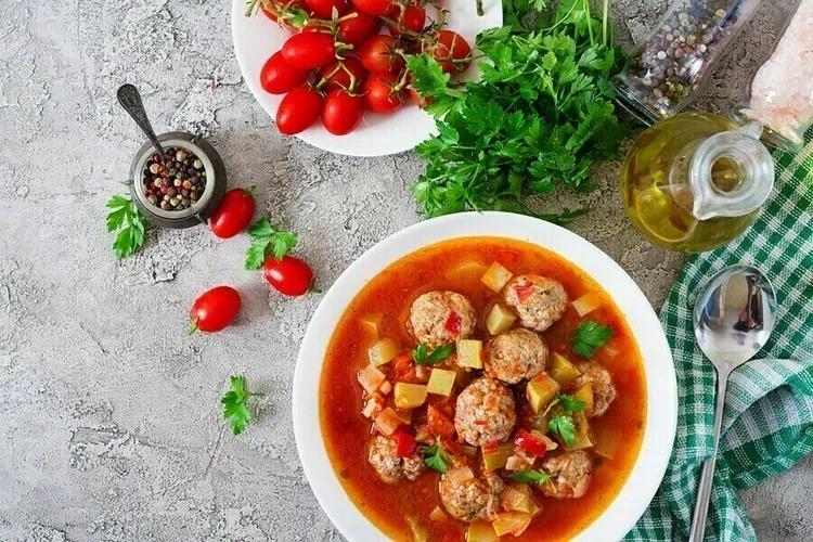 Paleo italian meatball soup with coconut oil, vegetables and ground beef