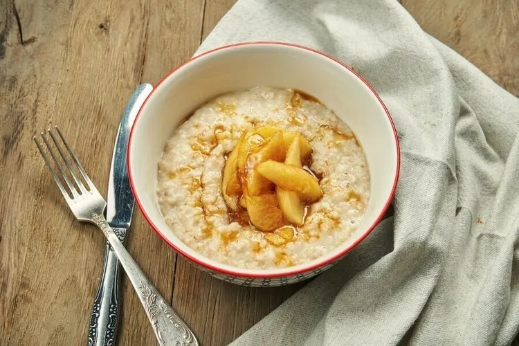 Warm peach cobbler oatmeal with pecans