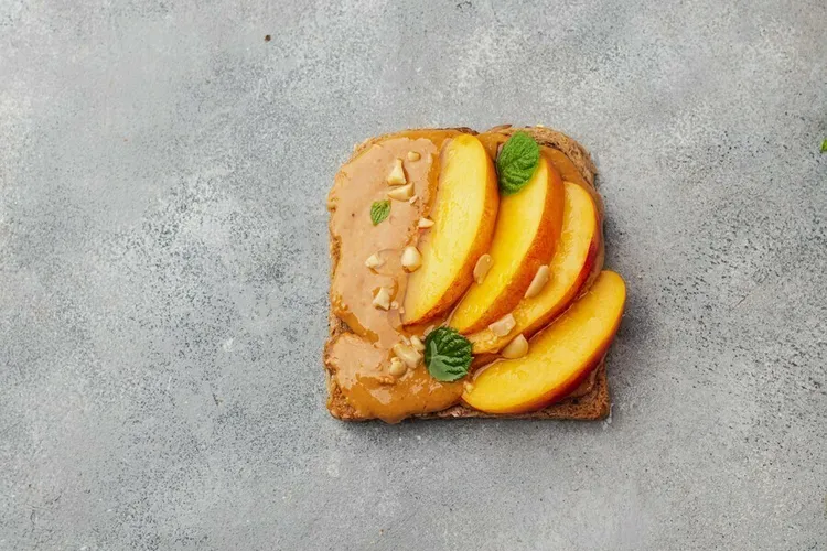 Peanut butter and peach toast with whole-wheat bread