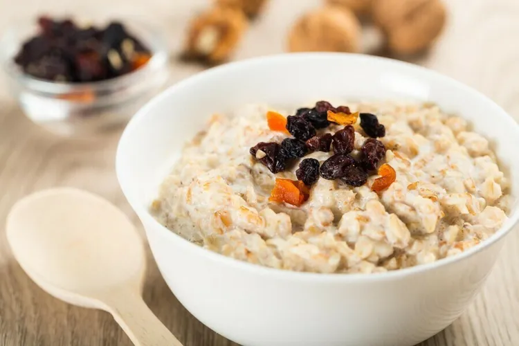 Cinnamon raisin peanut butter oatmeal with milk