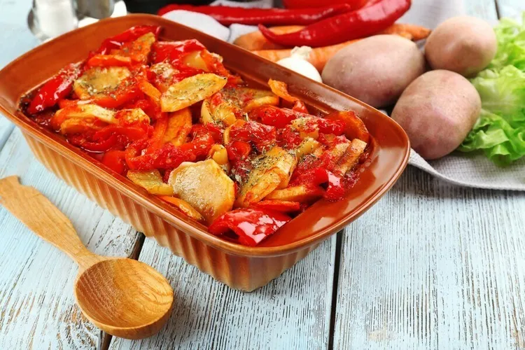 Roasted peppers, tomatoes and potatoes with olive oil