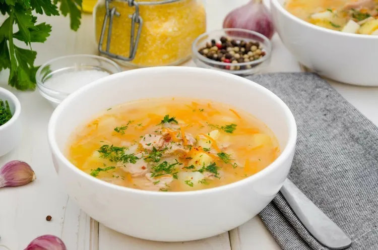 Chicken rivel soup with sweet corn