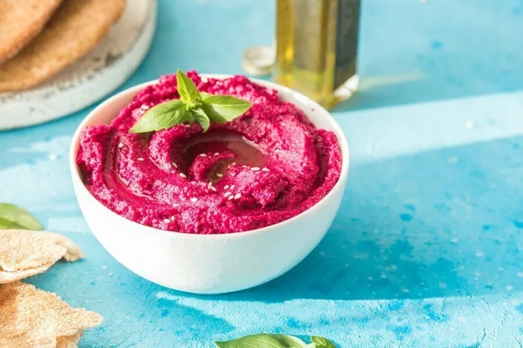 Roasted beetroot hummus with zucchini, carrots and sesame butter