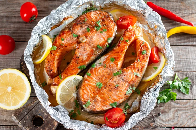 Lemon-herb baked salmon with tomatoes and shallots