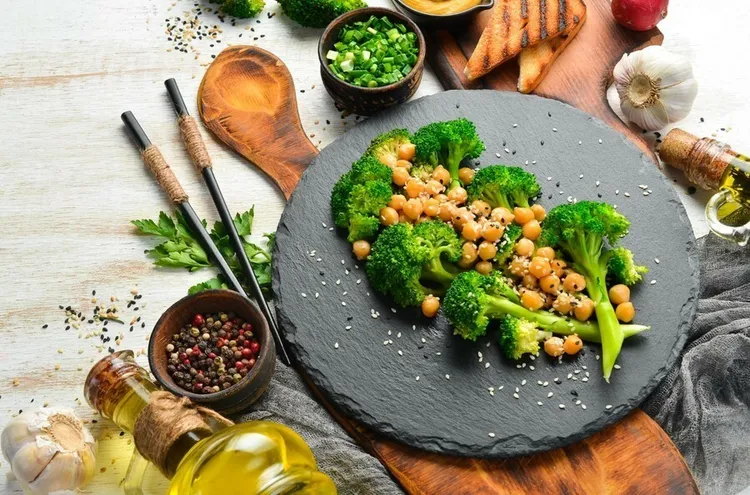 Garlic-infused sautéed chickpeas with broccoli and parmesan