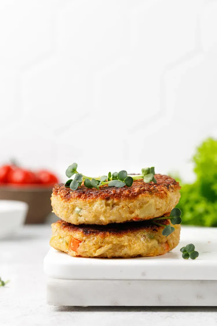 Quinoa veggie burgers with cheddar cheese, carrots and sunflower seeds