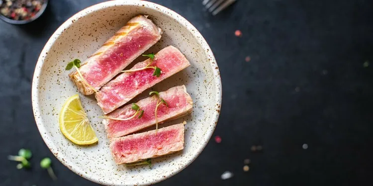 Ginger-lime seared ahi tuna with soy sauce and sesame oil