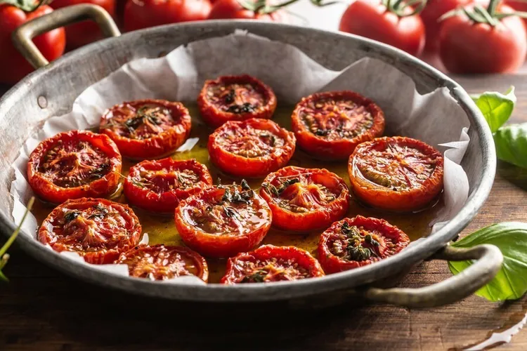 Slow-roasted mediterranean tomatoes with thyme, salt and pepper