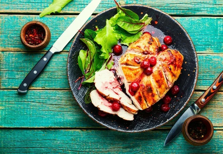 Smoked-chicken, cranberry and almond salad with coriander and lime juice