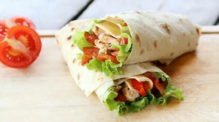 Southwest chicken bacon wrap with monterey cheese and fresh veggies