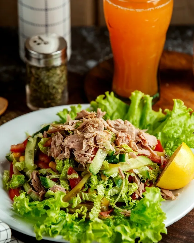Tuna salad with olives, capers and avocado
